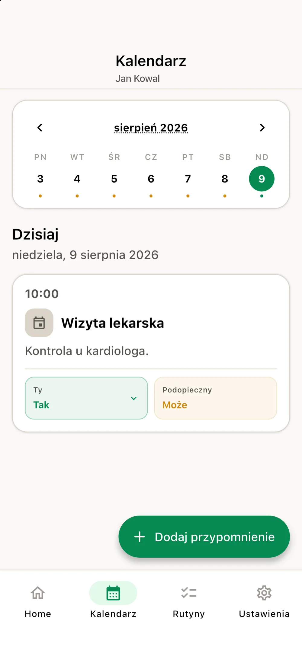 Kalendarz w aplikacji opiekuna z wizytą lekarską i przyciskiem „Dodaj przypomnienie”